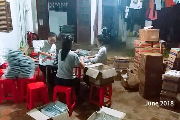 Volunteers Getting Books Ready For New School Year