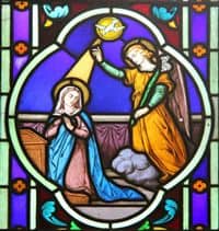 Stained Glass Window depiction of the Annunciation, an Angel appearing to Mary.
