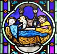 Stained Glass Window depiction of the birth of Jesus.