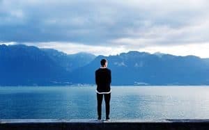 Man looking across the sea