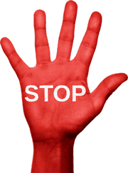 Open red hand with the word STOP