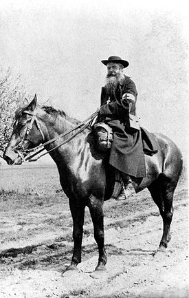 Photograph of Daniel Brottier on horseback