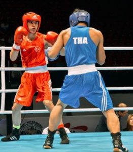 Two Thai boxers in ring