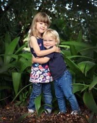 Two children hugging
