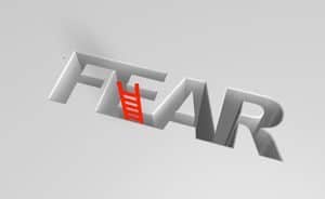 Ladder protruding out from the word fear.