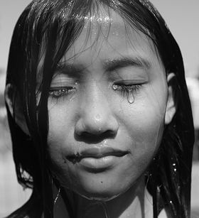 Young girl crying