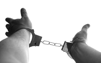 Person in handcuffs