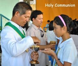 Young Person receiving Holy Communion
