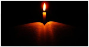 Candle and book