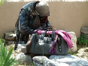 Homeless man and his possessions