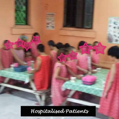 Hospitalised patients preparing to eat.