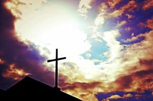 Cross against sky background