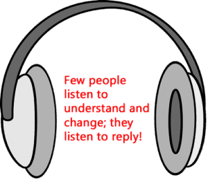 Headphones with quote: "Few people listen to understand and change, they listen to reply"