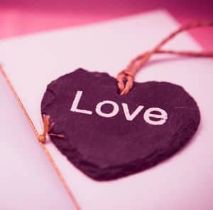 Purple Heart with inscription LOVE