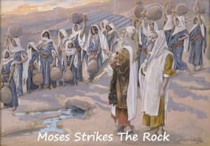 Moses strikes the rock and water flows