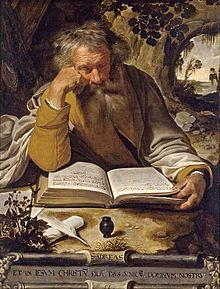 Image of St Andrew the Apostle sitting reading