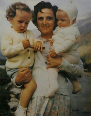 Image of St Gianna with two children in her arms