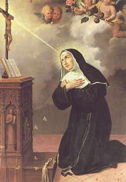 Image of St Rita kneeling in front of a Crucifix and receiving the Crown of Thorns stigmata.