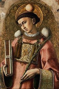 St Stephen the Deacon holding a Bible.