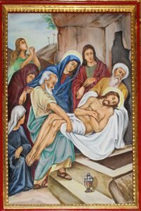 Fourteenth Station: Jesus is laid in the Tomb.