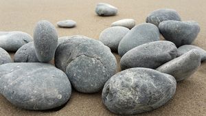 Smooth surfaced stones on beach