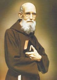 Image of Solanus Casey holding a Bible.