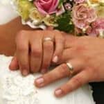 Wedding Rings on couples fingers