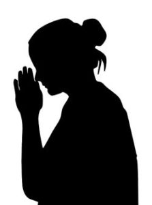Silhouette of Woman Praying