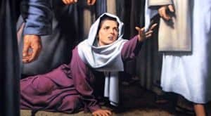 Woman attempting to touch Jesus' cloak