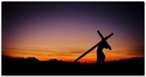 Silhouette of Jesus Carrying Cross