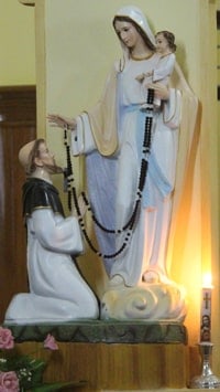 St Dominic kneeling at the feet of the Blessed Virgin Mary